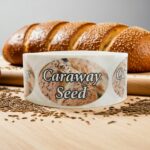 caraway seed bread sticker on a roll of labels
