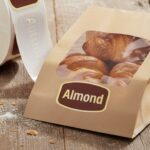 almond sticker on a gold foil