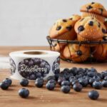 blueberry sticker on a roll of labels with blueberries pictured