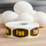 egg label on a sticker with brown and yellow print