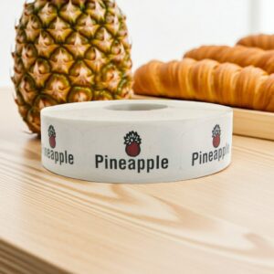 pineapple sticker on a white label with a picture on a pineapple