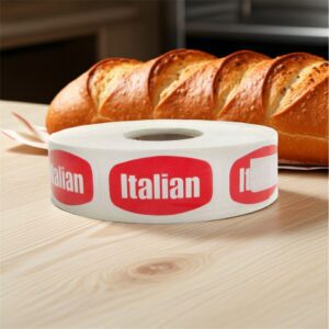 italian sticker with red background and white text next to italian bread