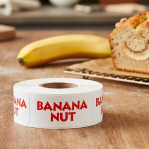 banana nut label rectangle sticker with white background and red text in front of banana nut bread