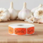 garlic sticker on a red label with black print