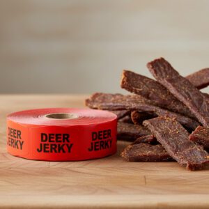 deer jerky sticker on a red label with black print