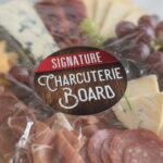 Charcuterie Board Sticker with the text that reads signature charcuterie board