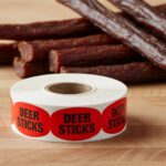 deer sticks sticker on a red label with black print
